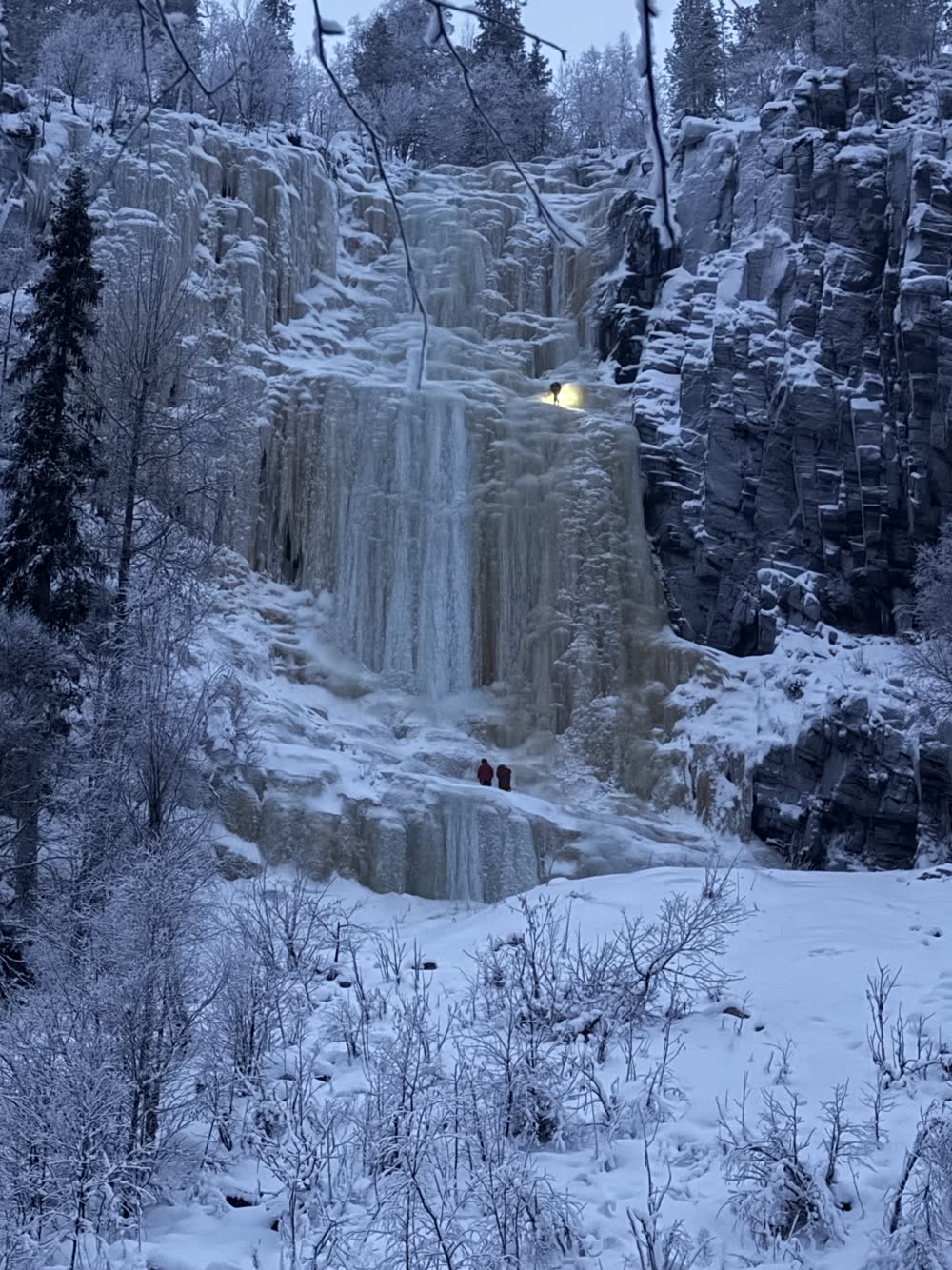 Giant frozen waterfalls in the snowy Korouoma canyon